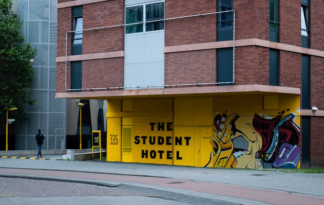 grafitti saying 'the student hotel' on the side of a building