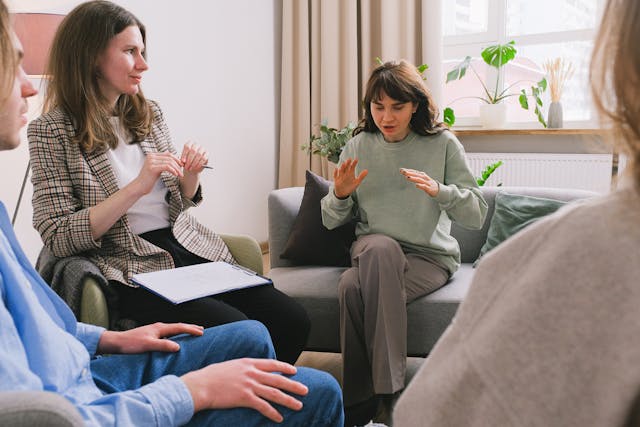 young people having a group therapy session