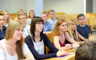 Distant studies students sitting together after having passed entry requirements