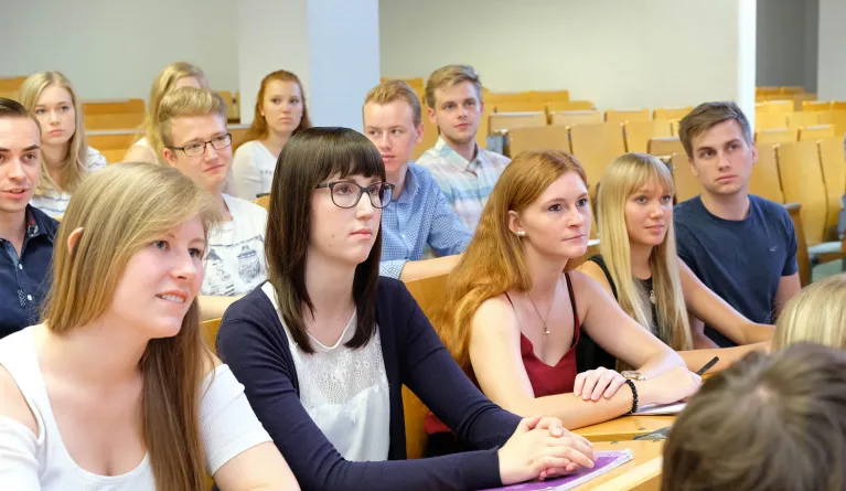 Distant studies students sitting together after having passed entry requirements