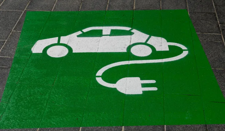 electric car charging green sign